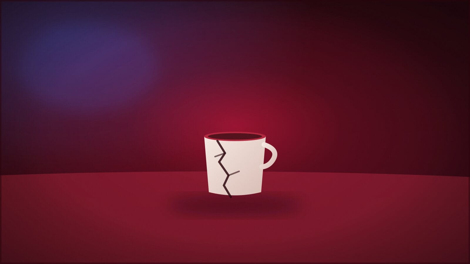 Ein gesprungener Keramikbecher, der allein auf einem Tisch steht.